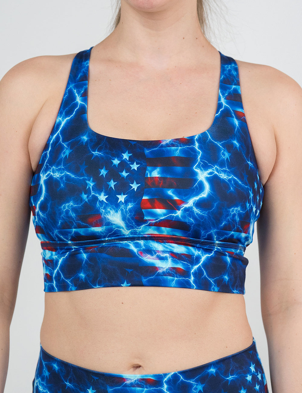 front of the lightning flag longline bra against a white background