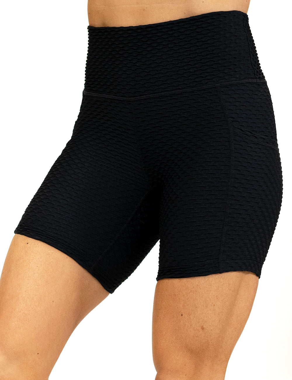 front of the 5 inch black waffled texture shorts against a white background