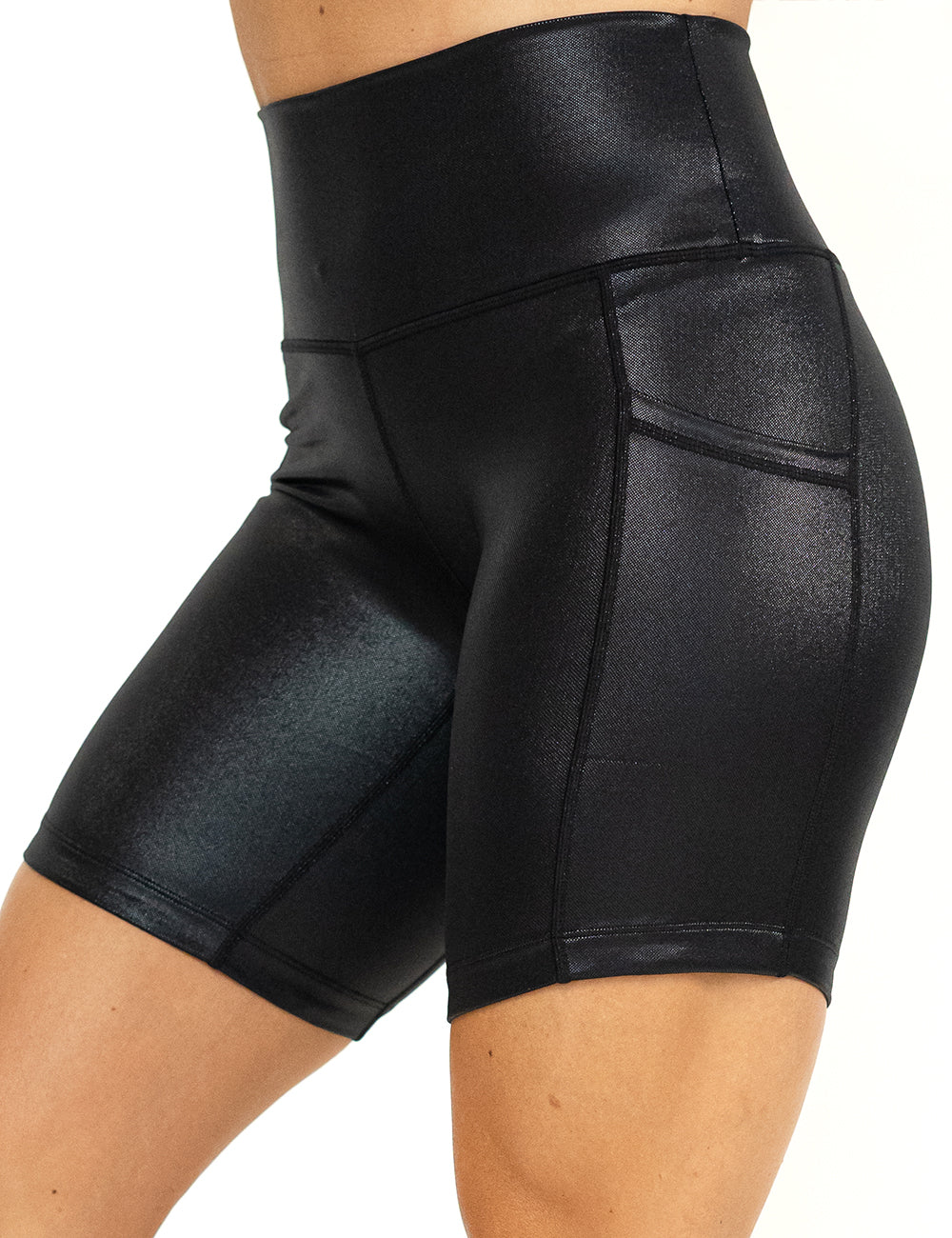 front of the 7 inch black leather shorts against a white background