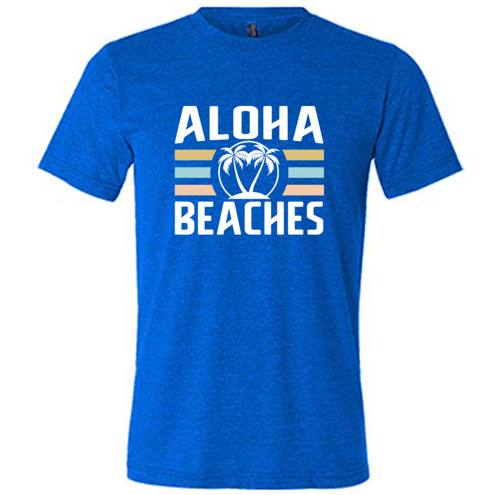 Blue colored shirt with a palm tree graphic on it that says "Aloha Beaches"