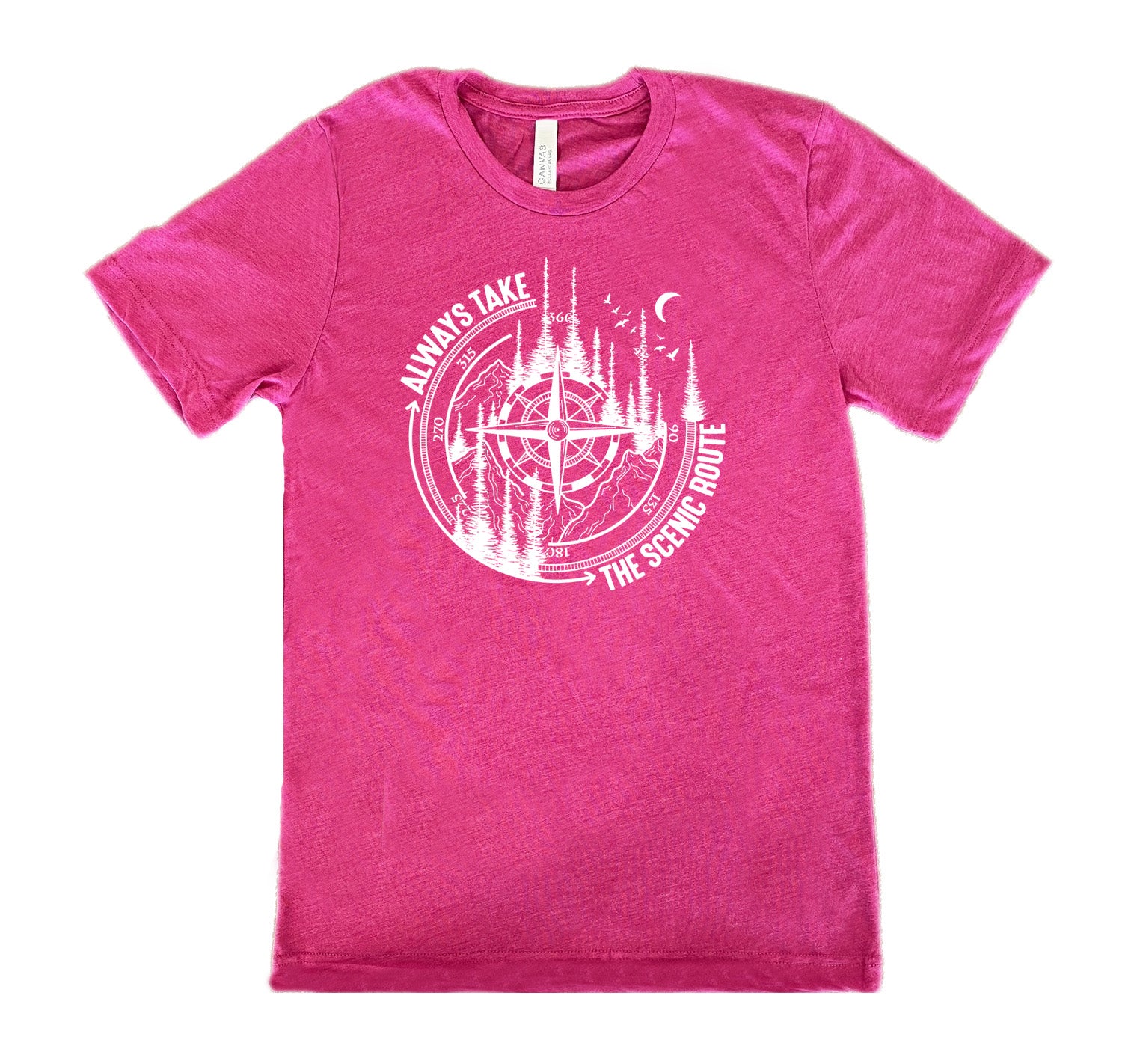 Berry colored shirt with a compass and forest graphic on it that says "Always Take The Scenic Route"