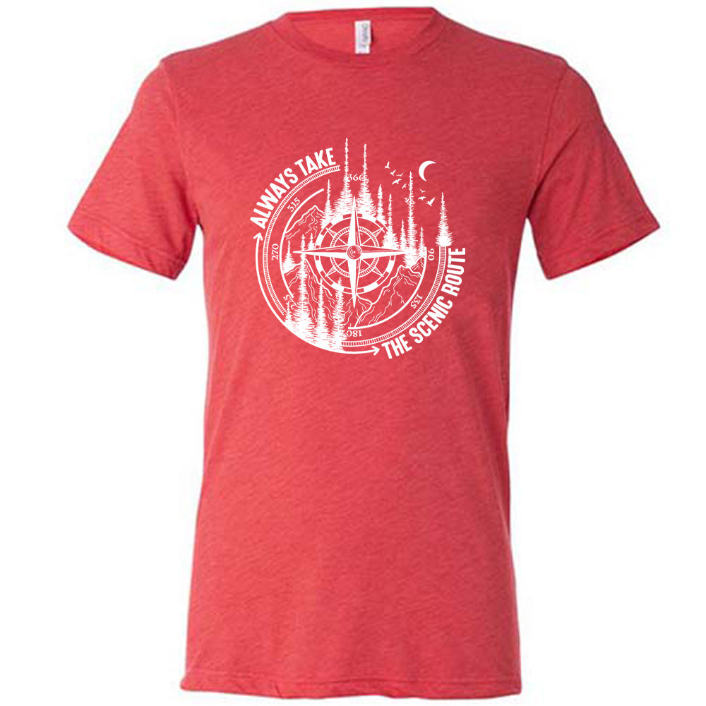 Red colored shirt with a compass and forest graphic on it that says "Always Take The Scenic Route"