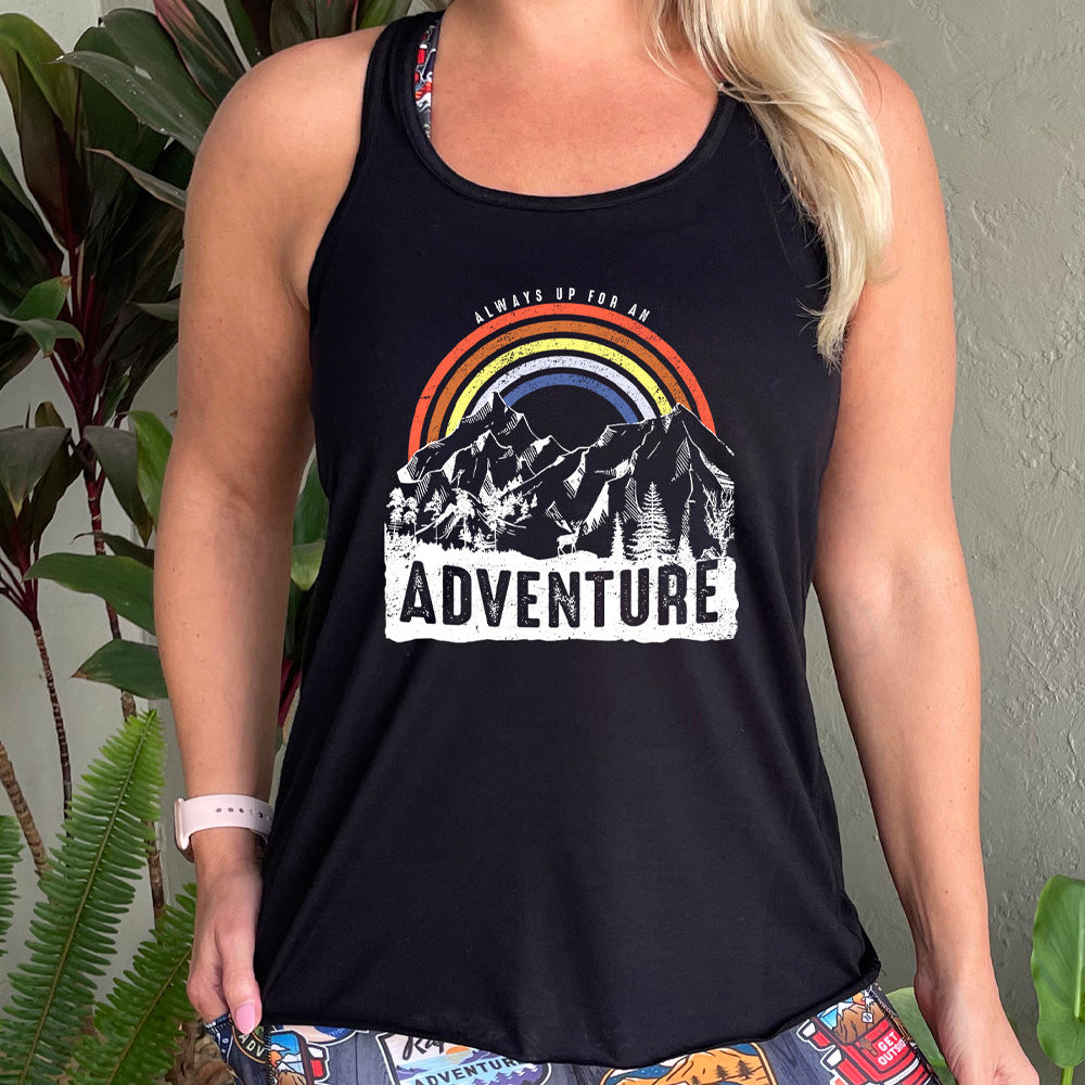 shirt with a rainbow over mountains graphic on it that says "Always Up For An Adventure"