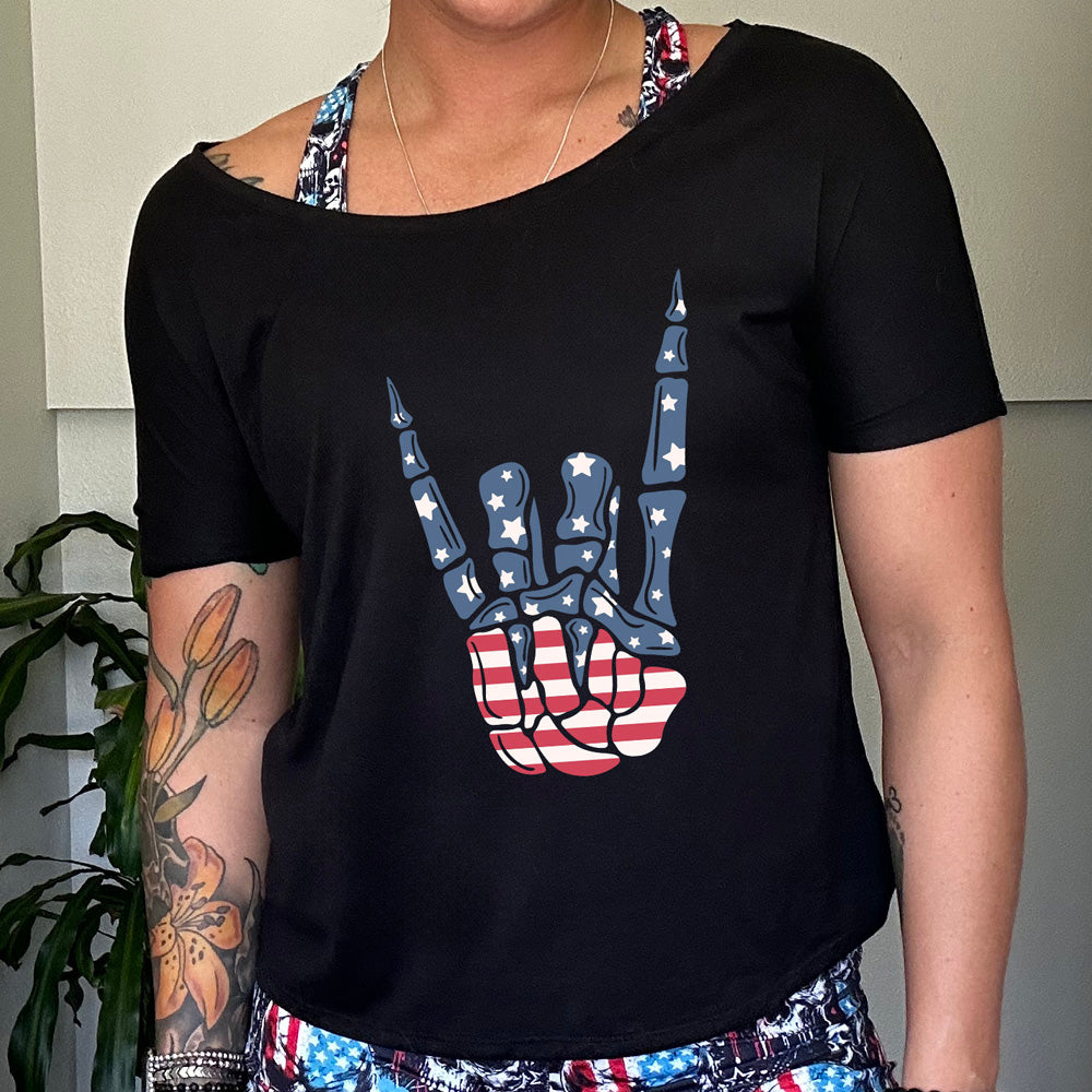 shirt with an American flag skeleton hand graphic on it