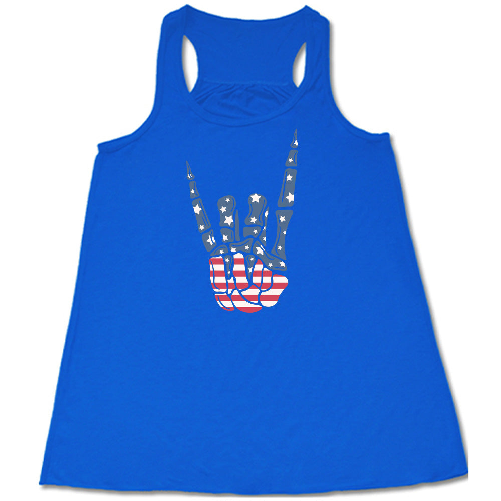Blue colored flowy tank with an American flag skeleton hand graphic on it