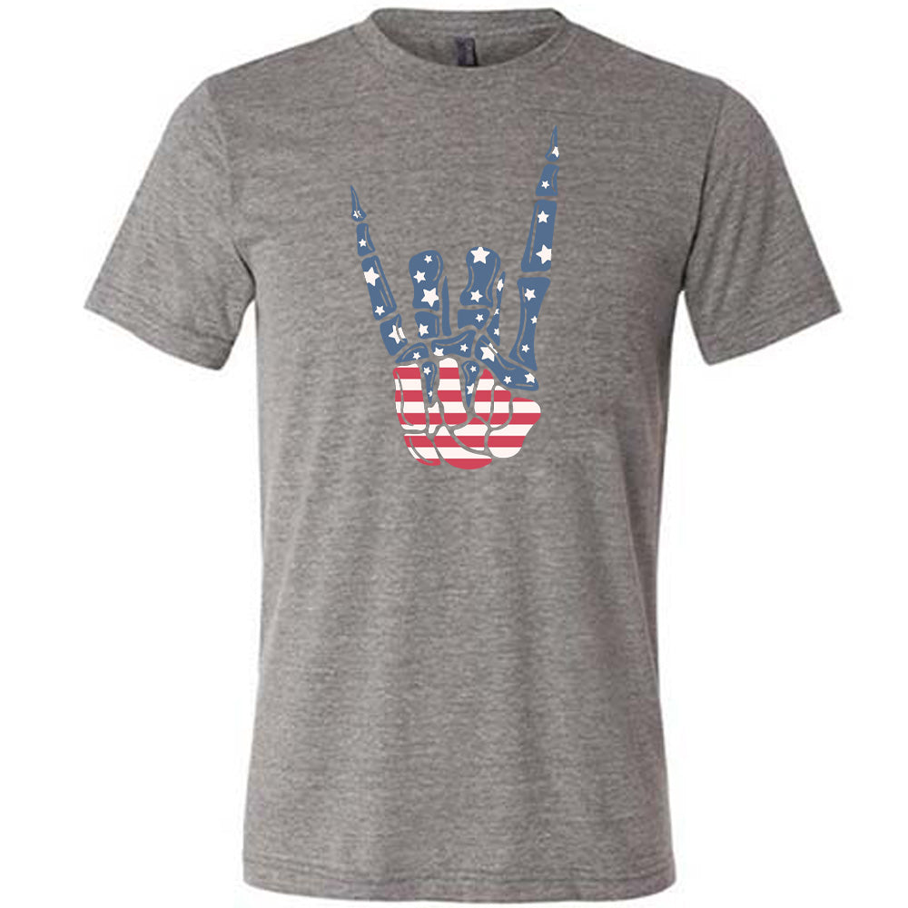 Grey colored shirt with an American flag skeleton hand graphic on it
