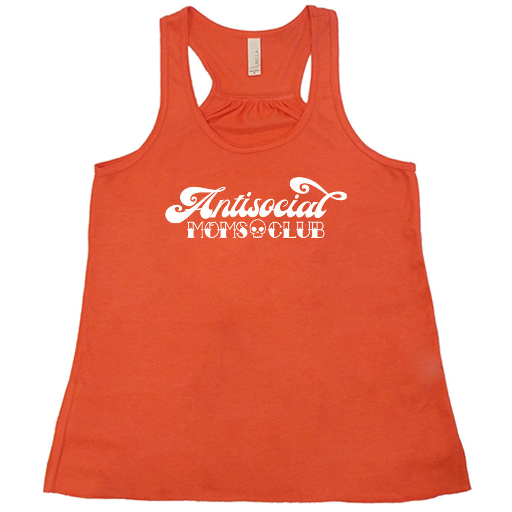 Coral colored flowy tank with a small skull graphic on it that says "Antisocial Moms Club"