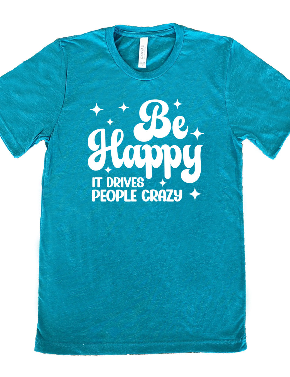 teal unisex tee with the words "be happy it drives people crazy" on it, with a number of stars around