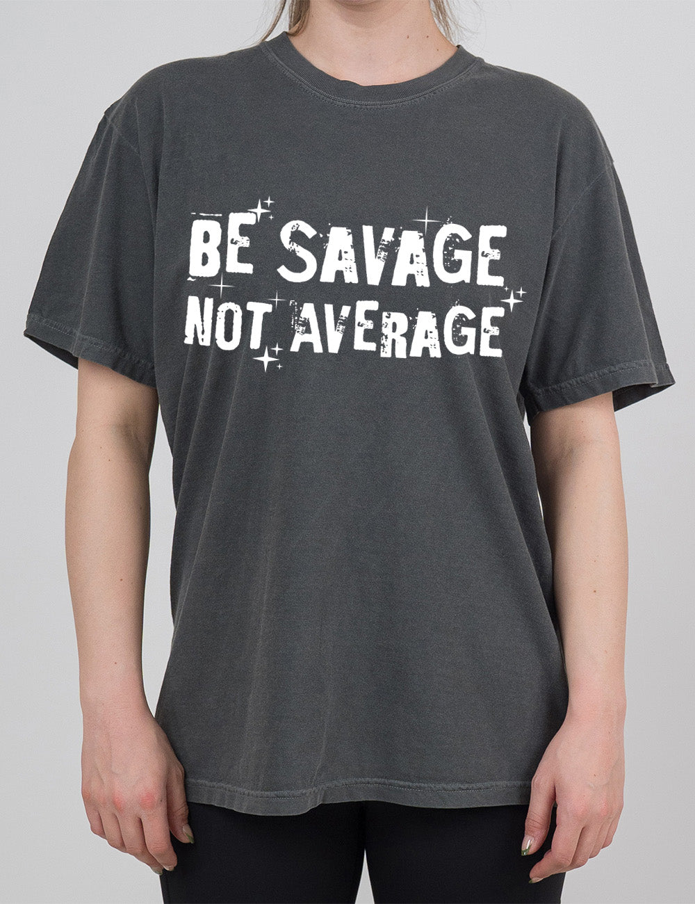 pepper modern tee with the words saying "be savage not average" on it, embellished with stars and shadowing on the words