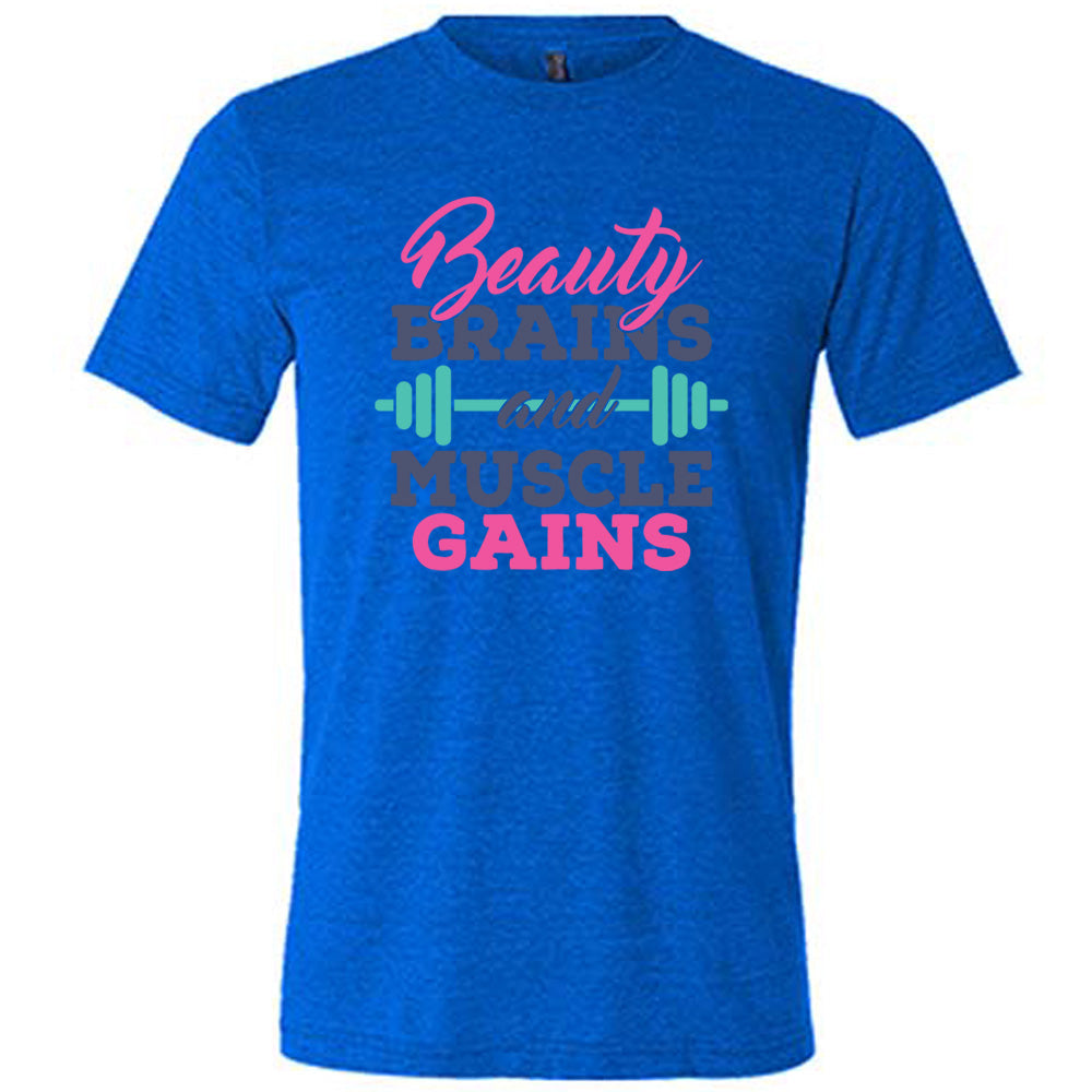 Blue Unisex Tee, with wording Beauty Brains and Muscle Gains, multicolored lettering with a barbell