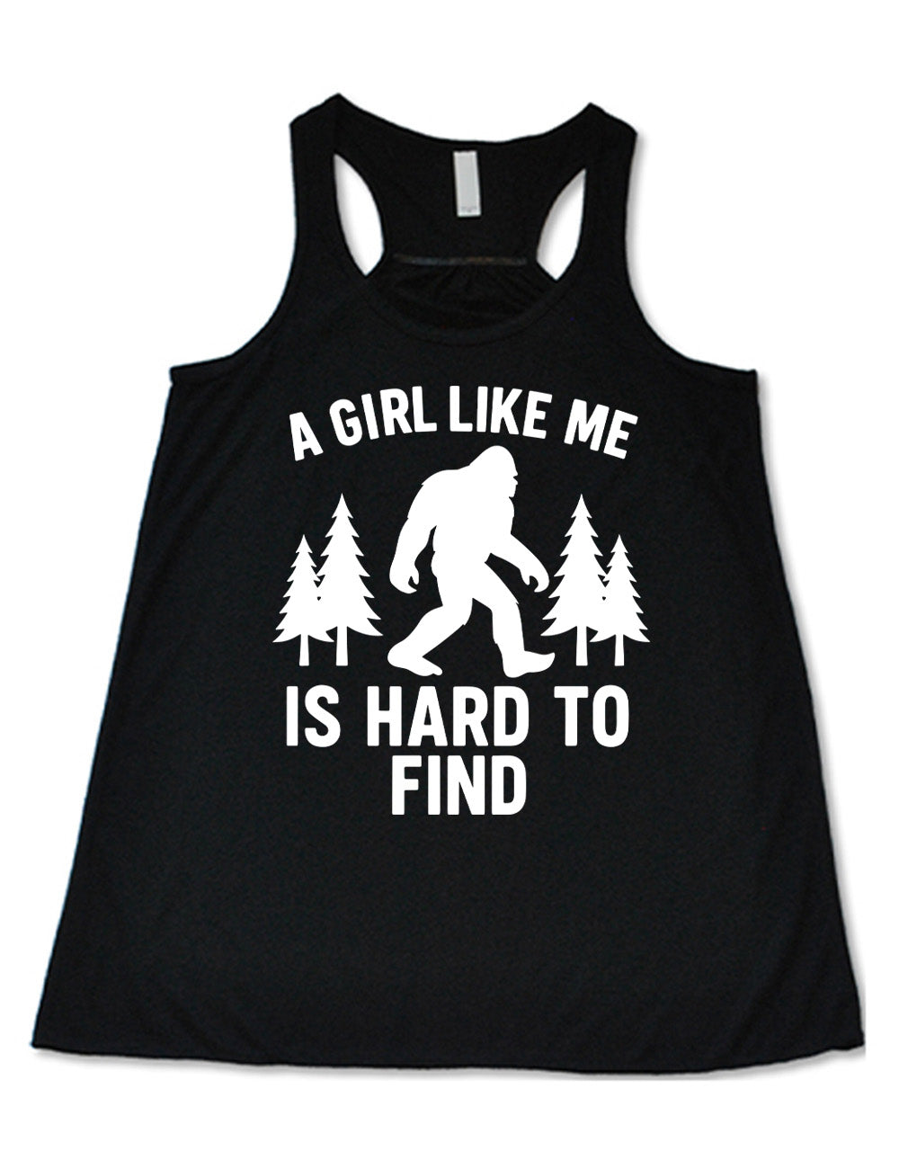black flowy racerback tank with the graphic of bigfoot's silhouette among a few pine trees, and the words surrounding it saying "a girl like me is hard to find"