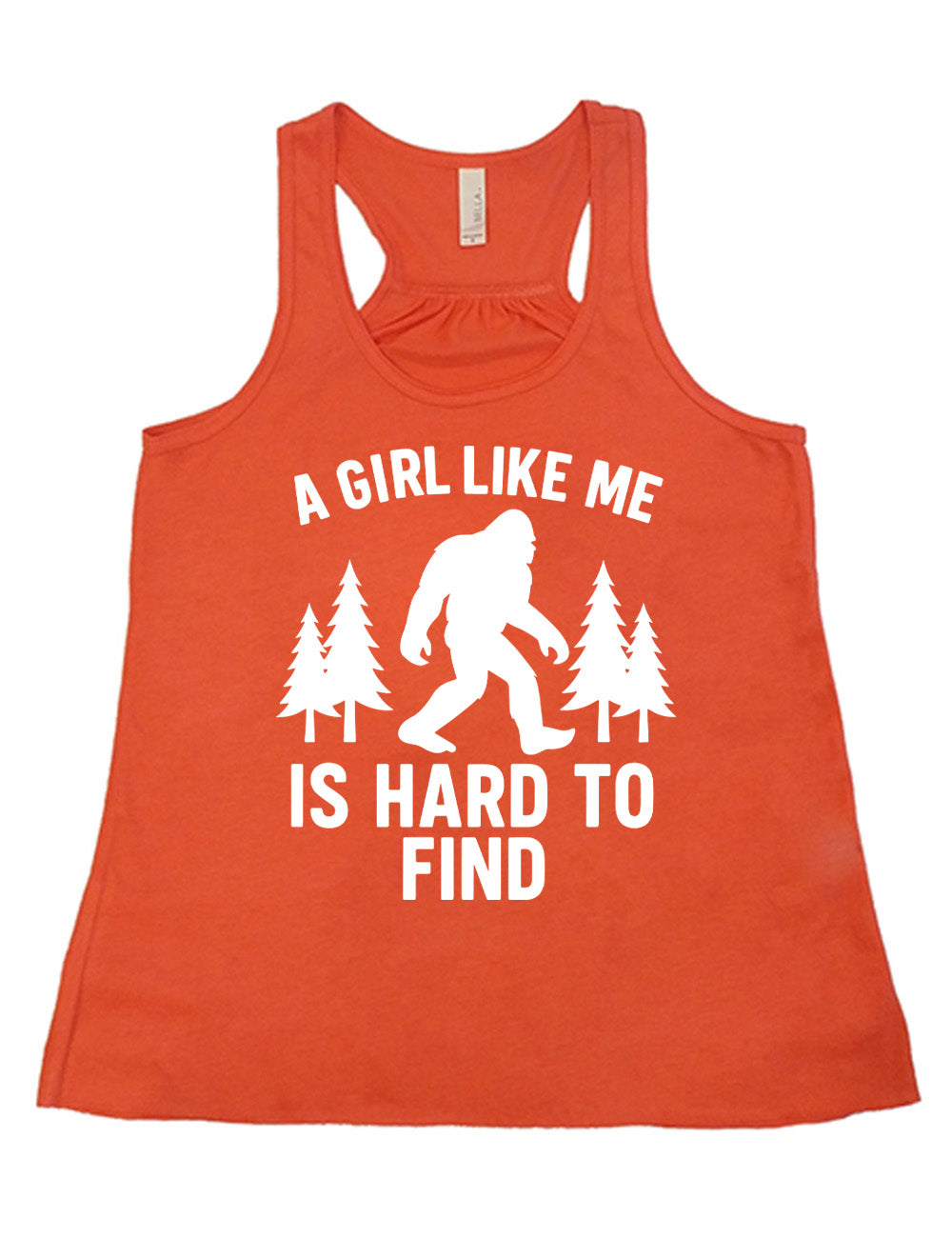 coral flowy racerback tank with the graphic of bigfoot's silhouette among a few pine trees, and the words surrounding it saying "a girl like me is hard to find"
