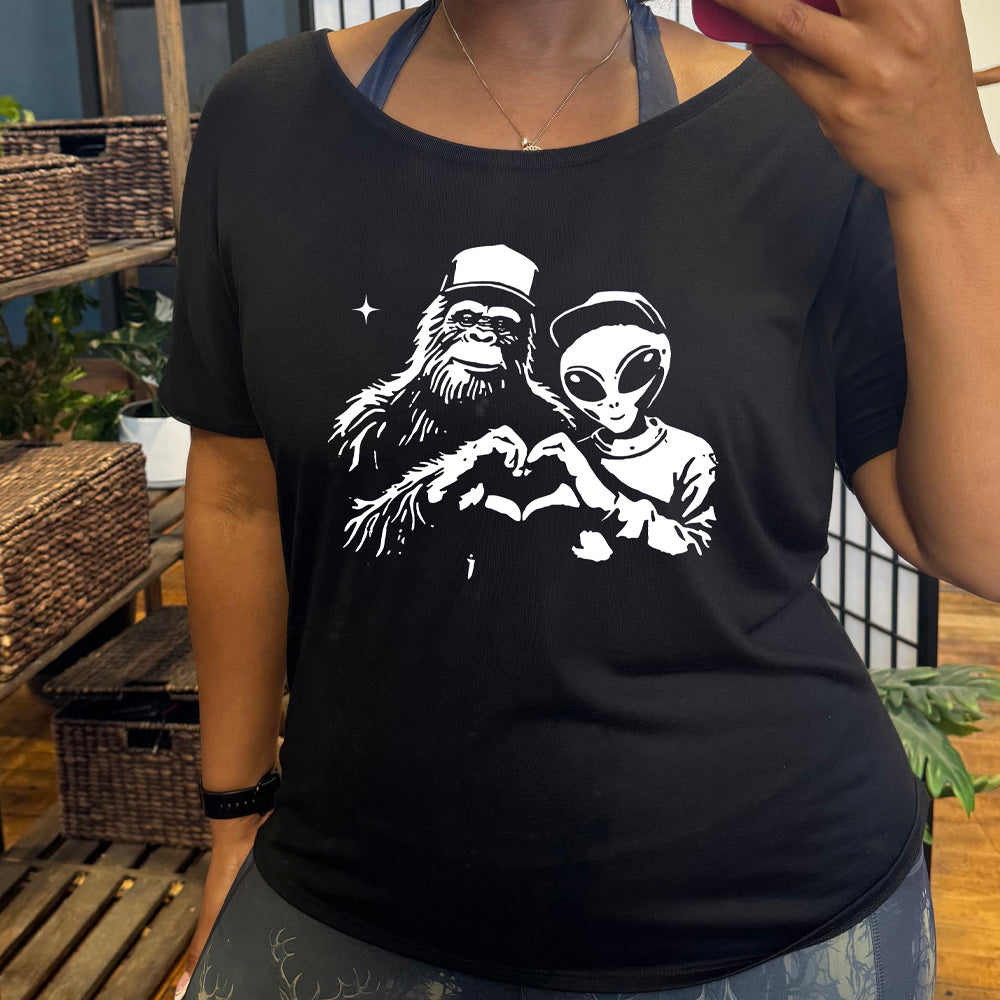 shirt with bigfoot and alien doing heart hands graphic on it