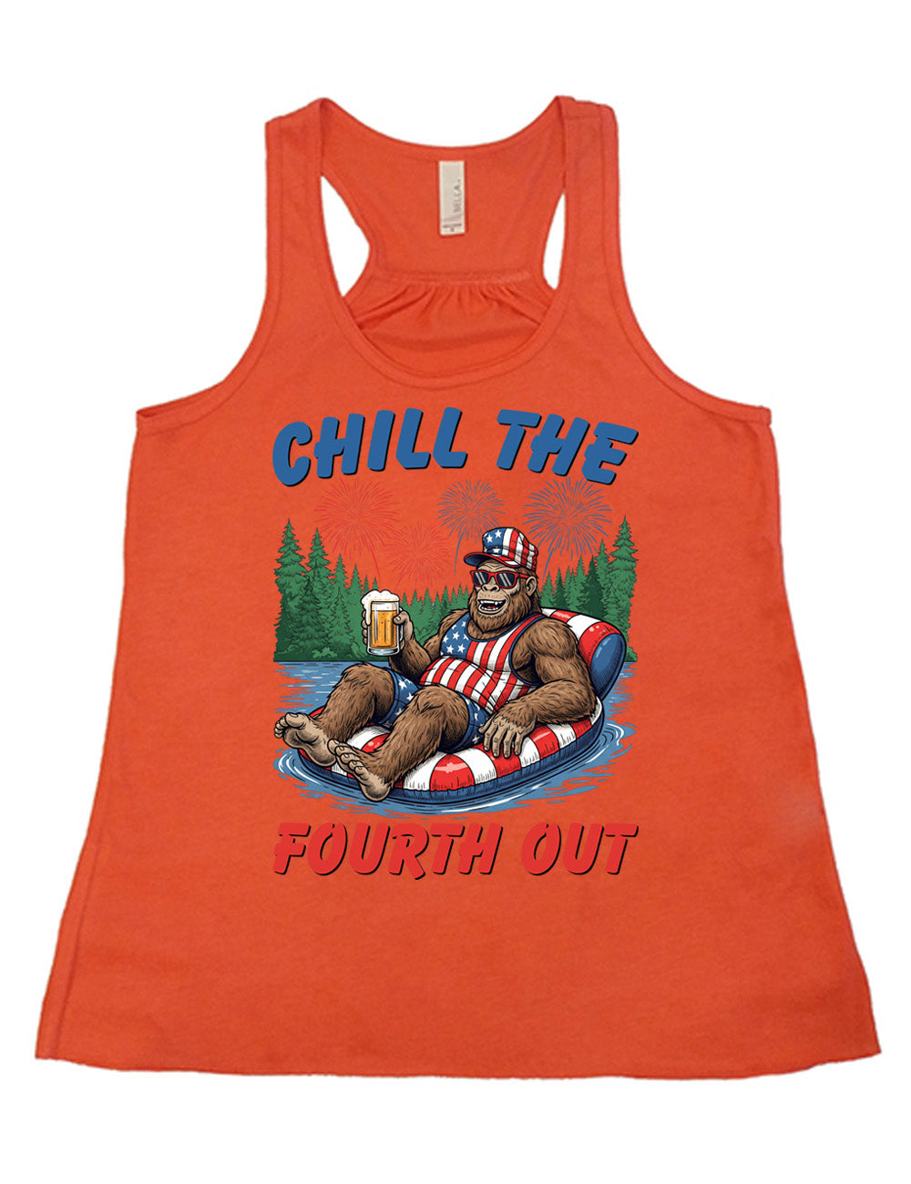 coral flowy racerback tank with the graphic of a grinning Bigfoot holding a beer, wearing sunglasses and an American flag outfit, in an American flag tube, in the water, with a background of trees, with fireworks above, and the words saying "chill the fourth out" on it