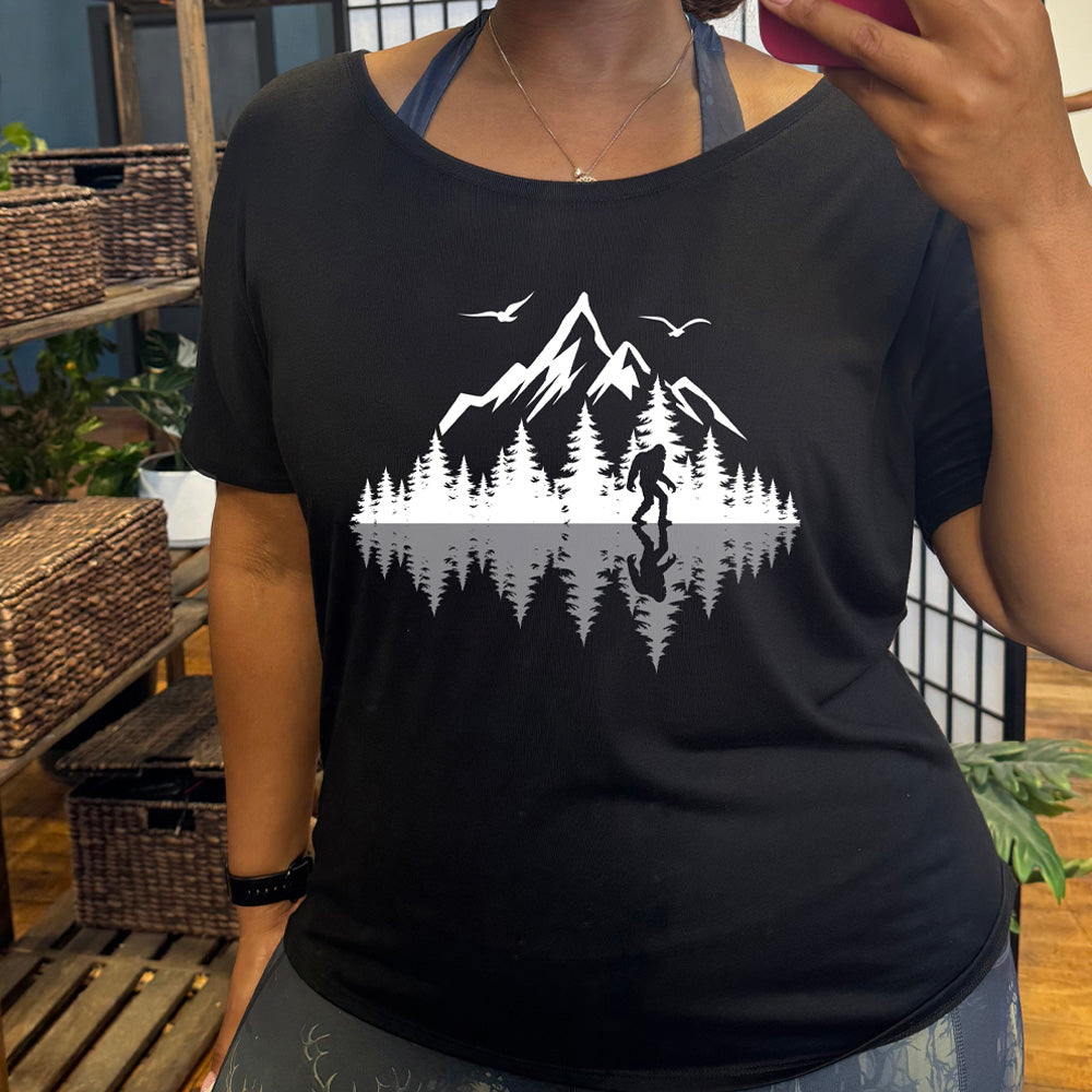 shirt with bigfoot in nature with reflection graphic on it