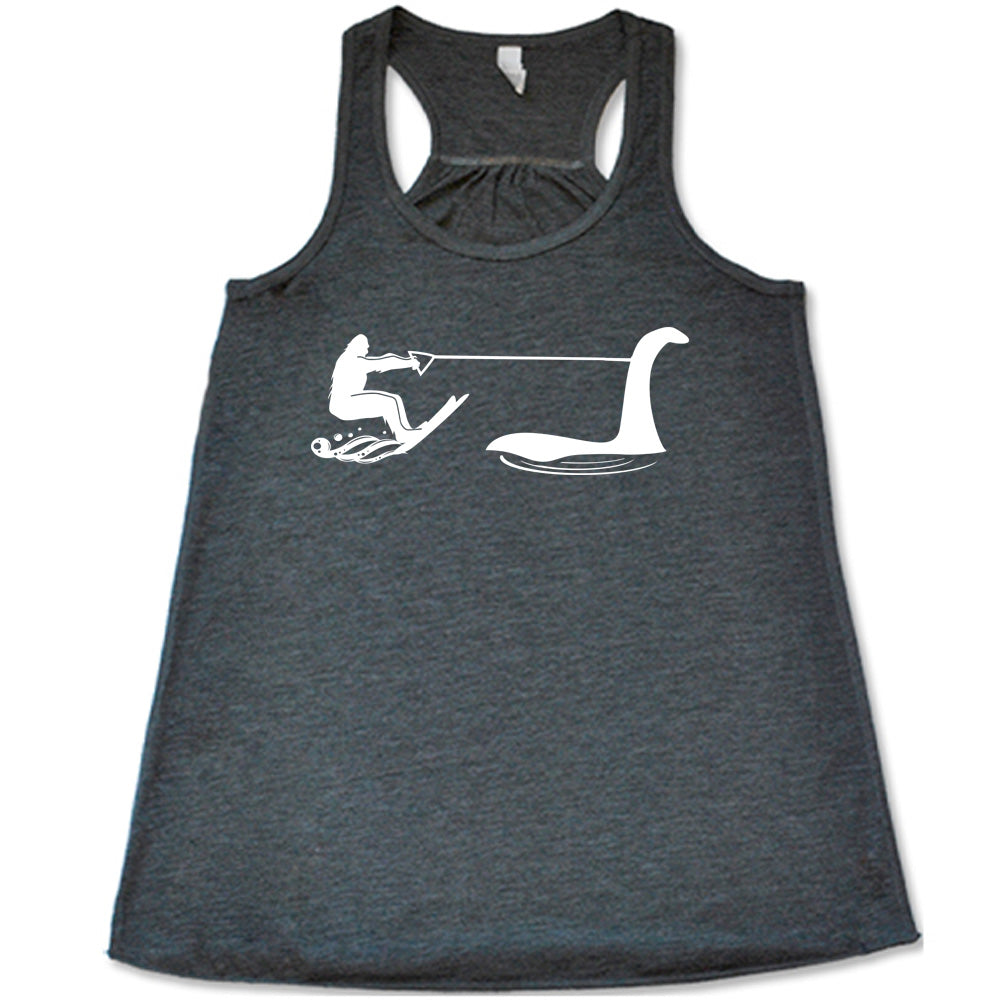 Grey colored flowy tank with bigfoot wakeboarding with Nessie graphic on it
