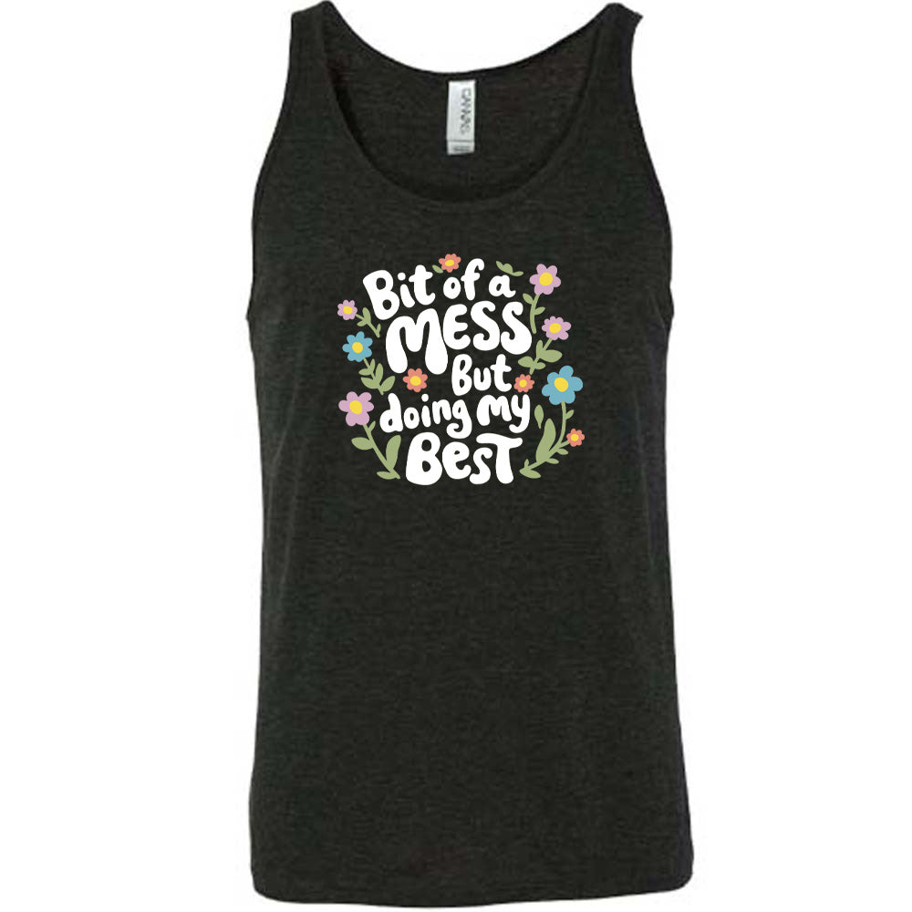 black shirt with the text "Bit of a Mess, But Doing My Best" on it