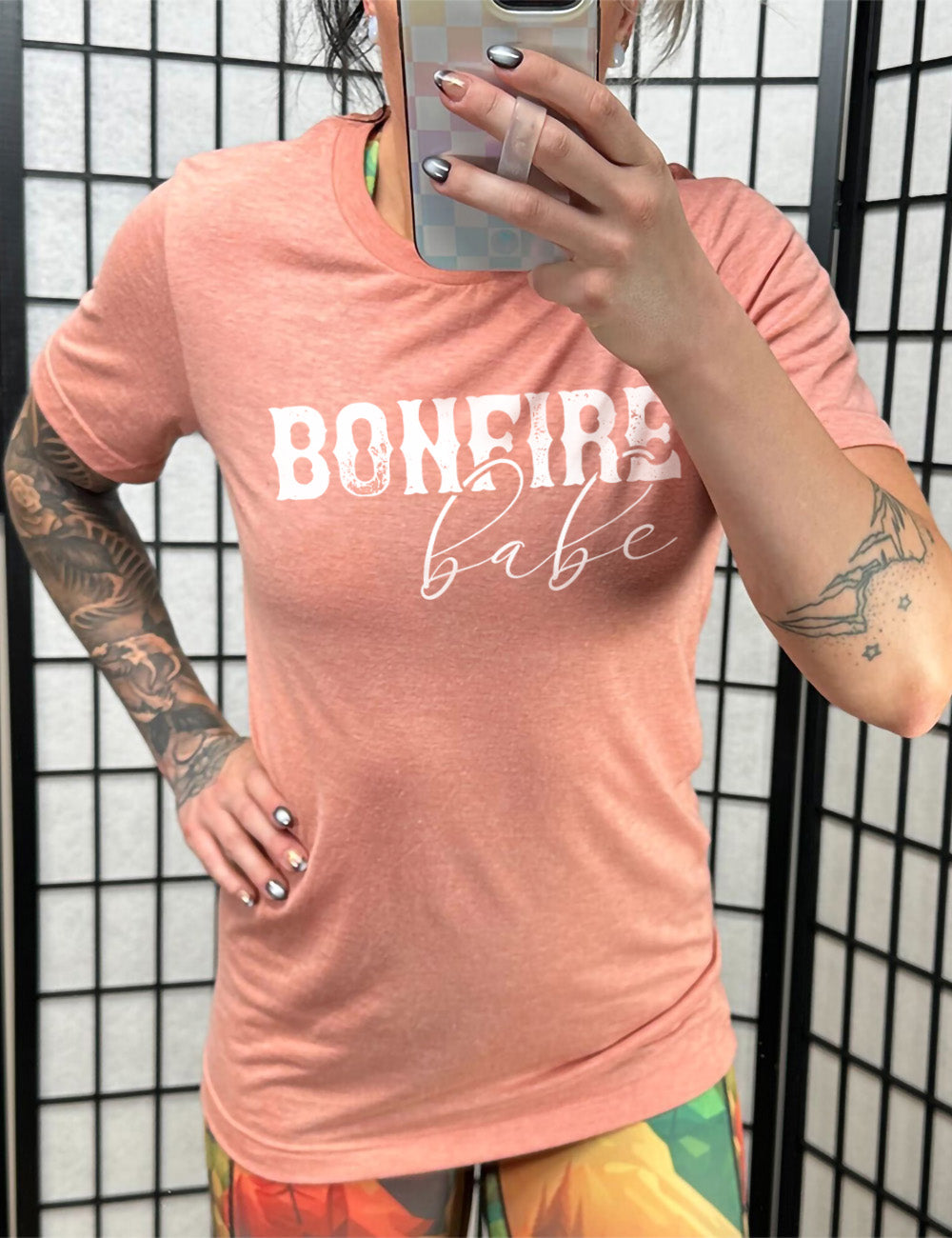 sunset unisex tee with the words "bonfire babe" on it