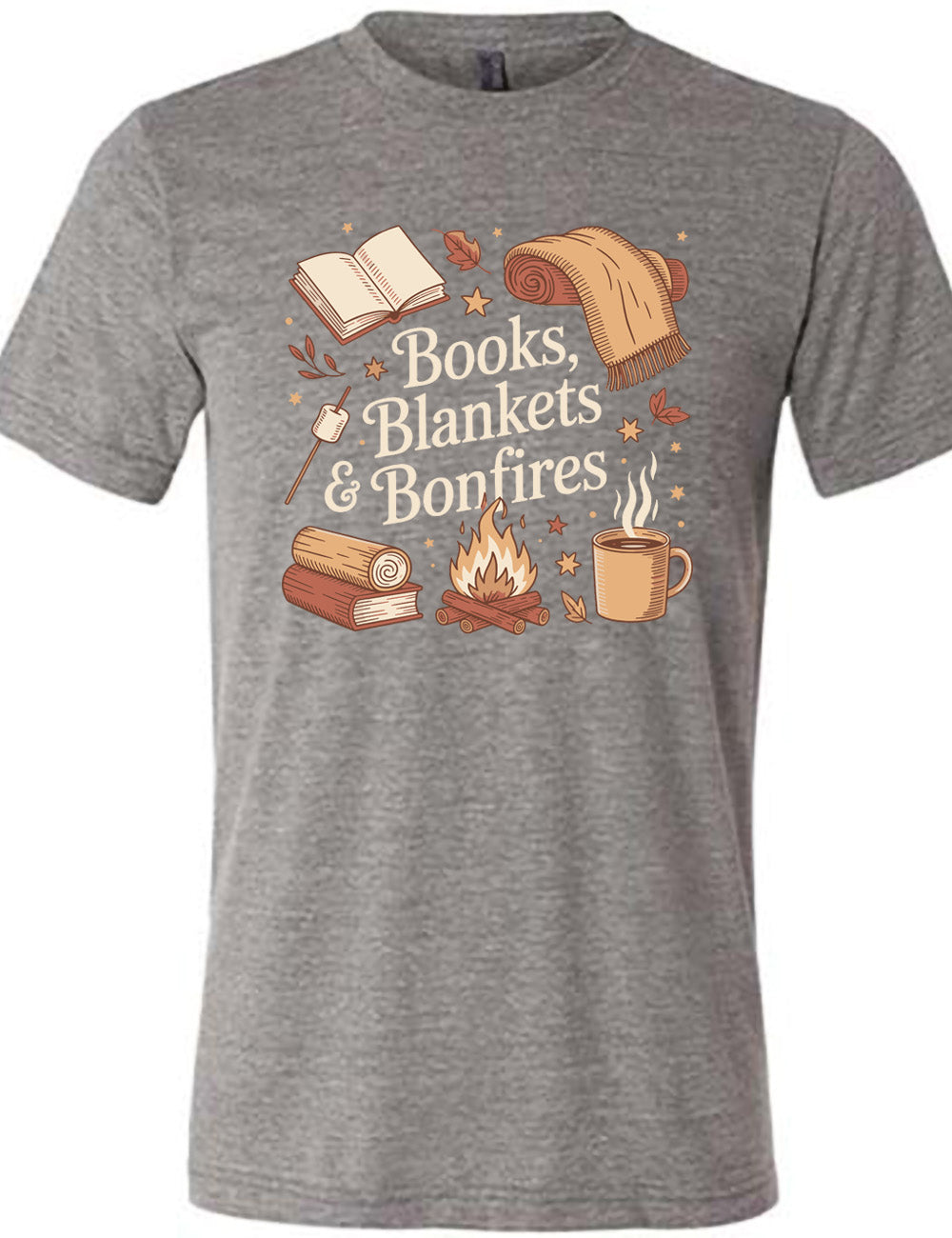grey unisex tee with the words "books, blankets & bonfires" on it, surrounded by graphics including an open book, a scarf partially rolled up, a steaming beverage in a mug, a campfire, a book with a log on top of it, and a marshmallow on a stick, as well as a lot of little stars and leaves