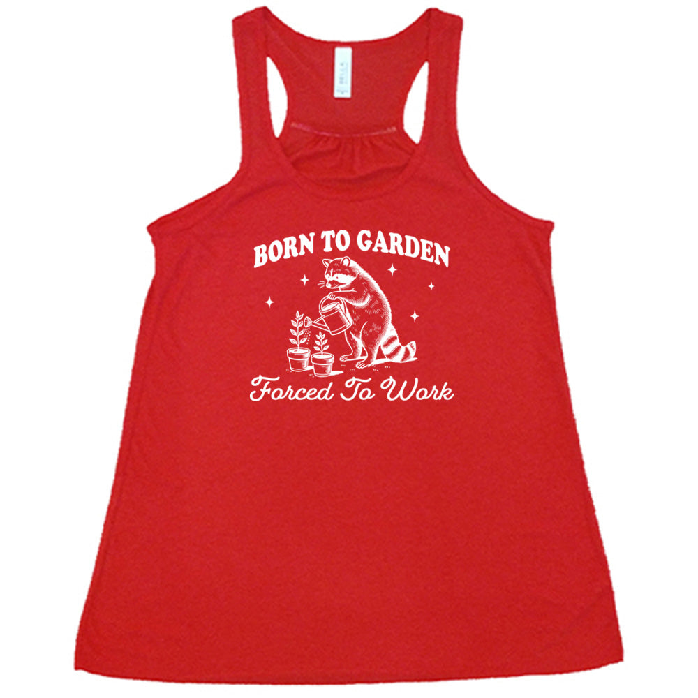 Red colored flowy tank with a gardening raccoon graphic on it that says "Born to Garden, Forced to Work"