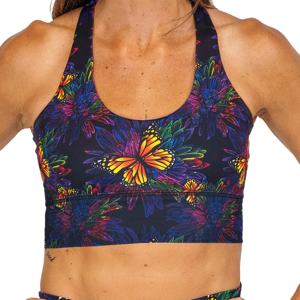 colorful butterfly patterned sports bra