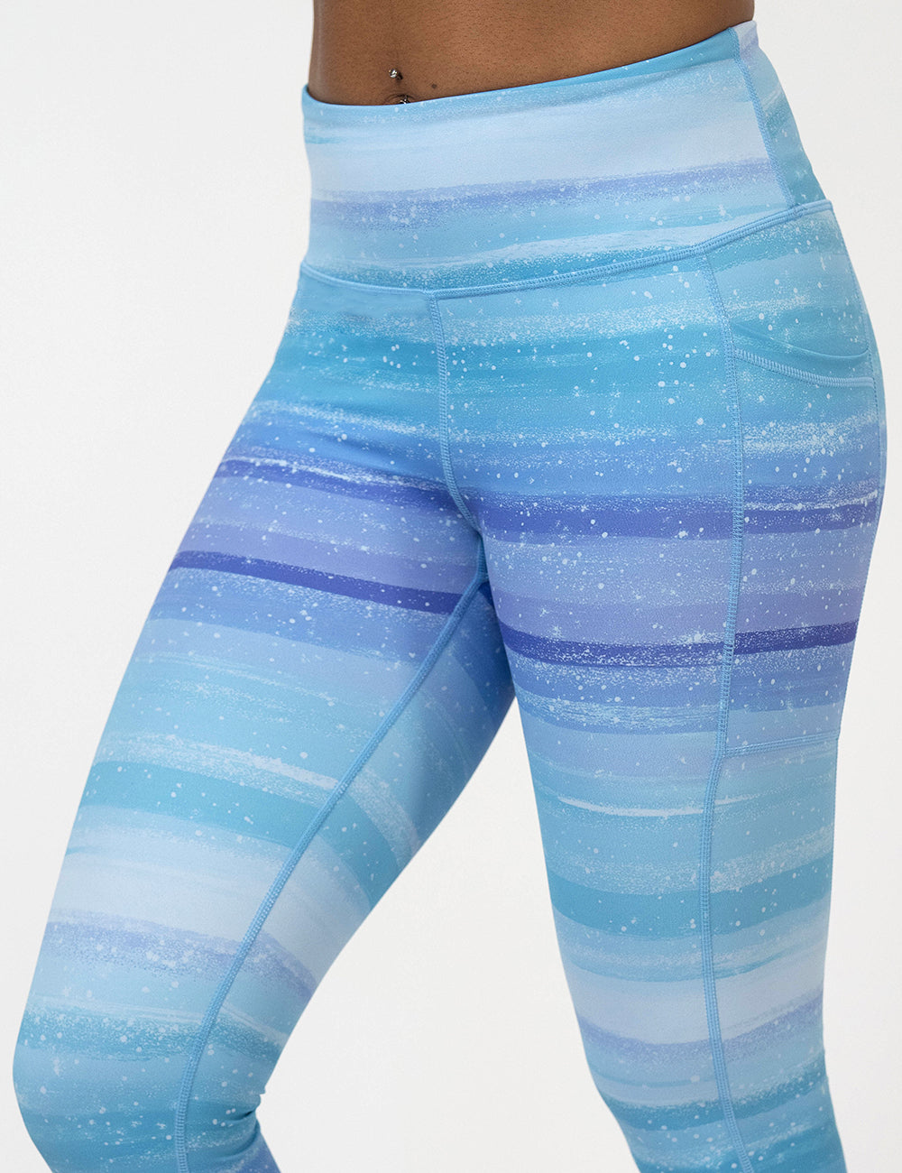 front of the blue and white ombre leggings against a white background