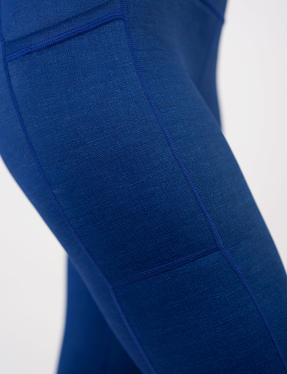 close up of the detailing on the blue denim inspired leggings