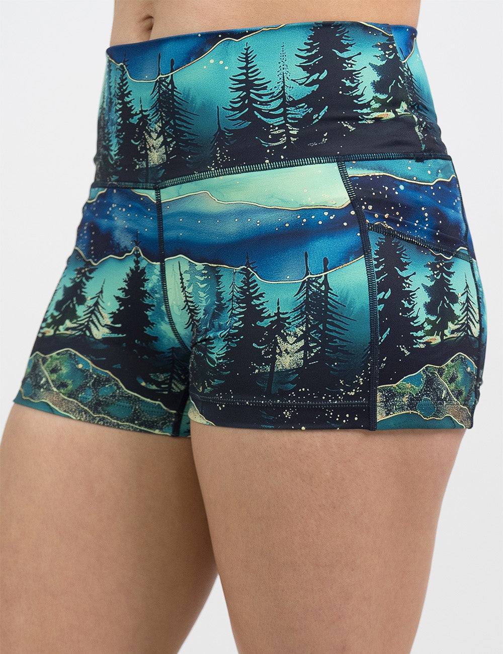 front of the 2.5 inch aurora forest shorts against a white background