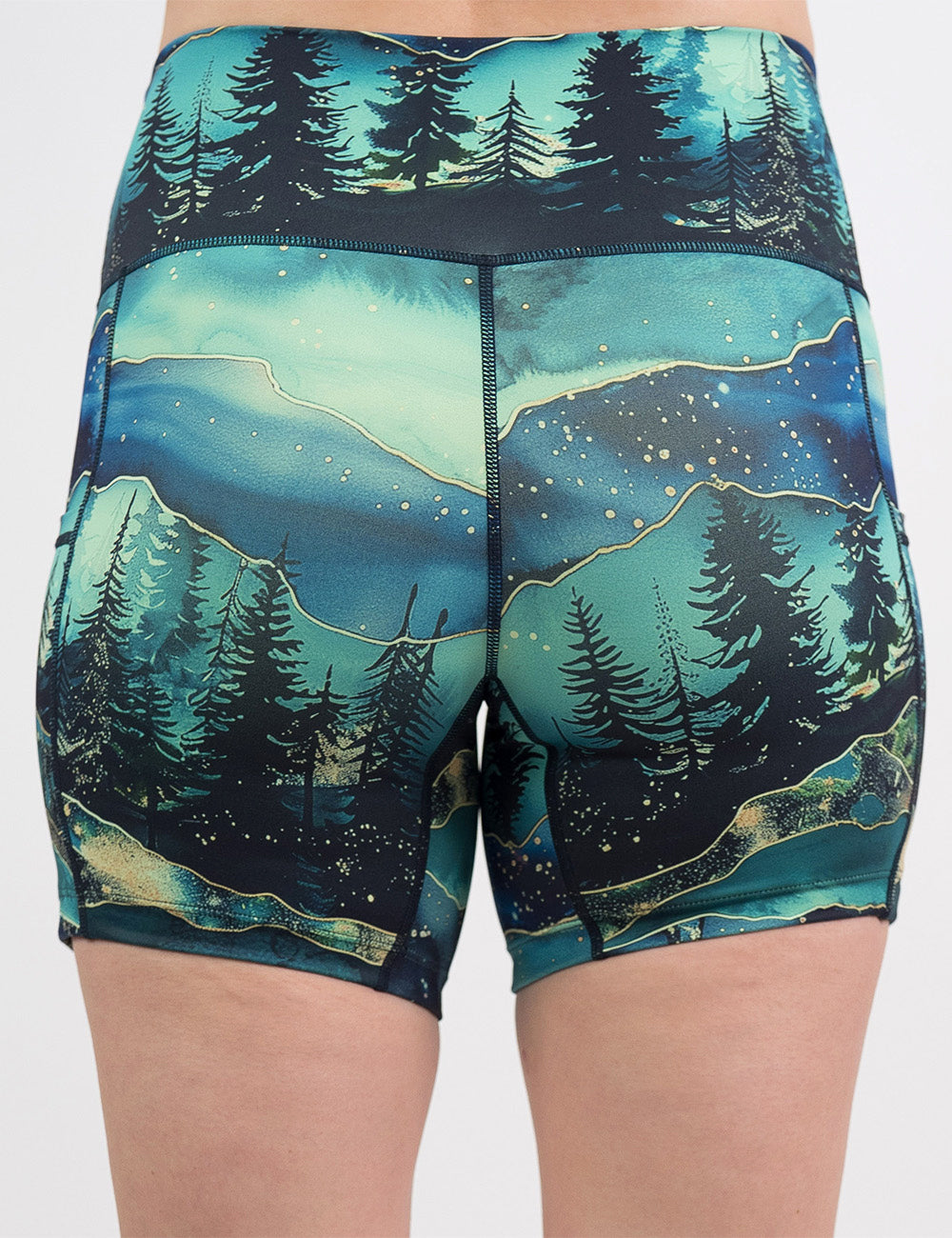 back of the 5 inch aurora forest shorts against a white background
