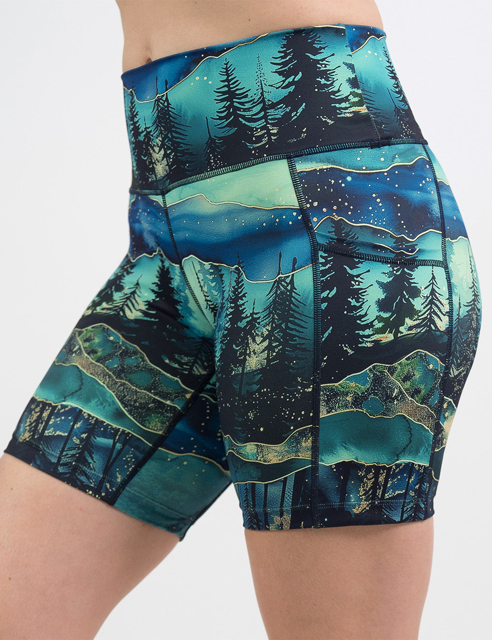 front of the 7 inch aurora forest shorts against a white background