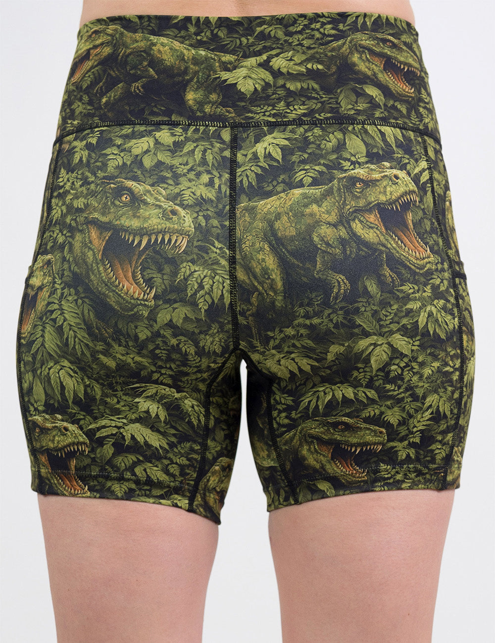 back of the 5 inch t-rex in a rainforest shorts against a white background