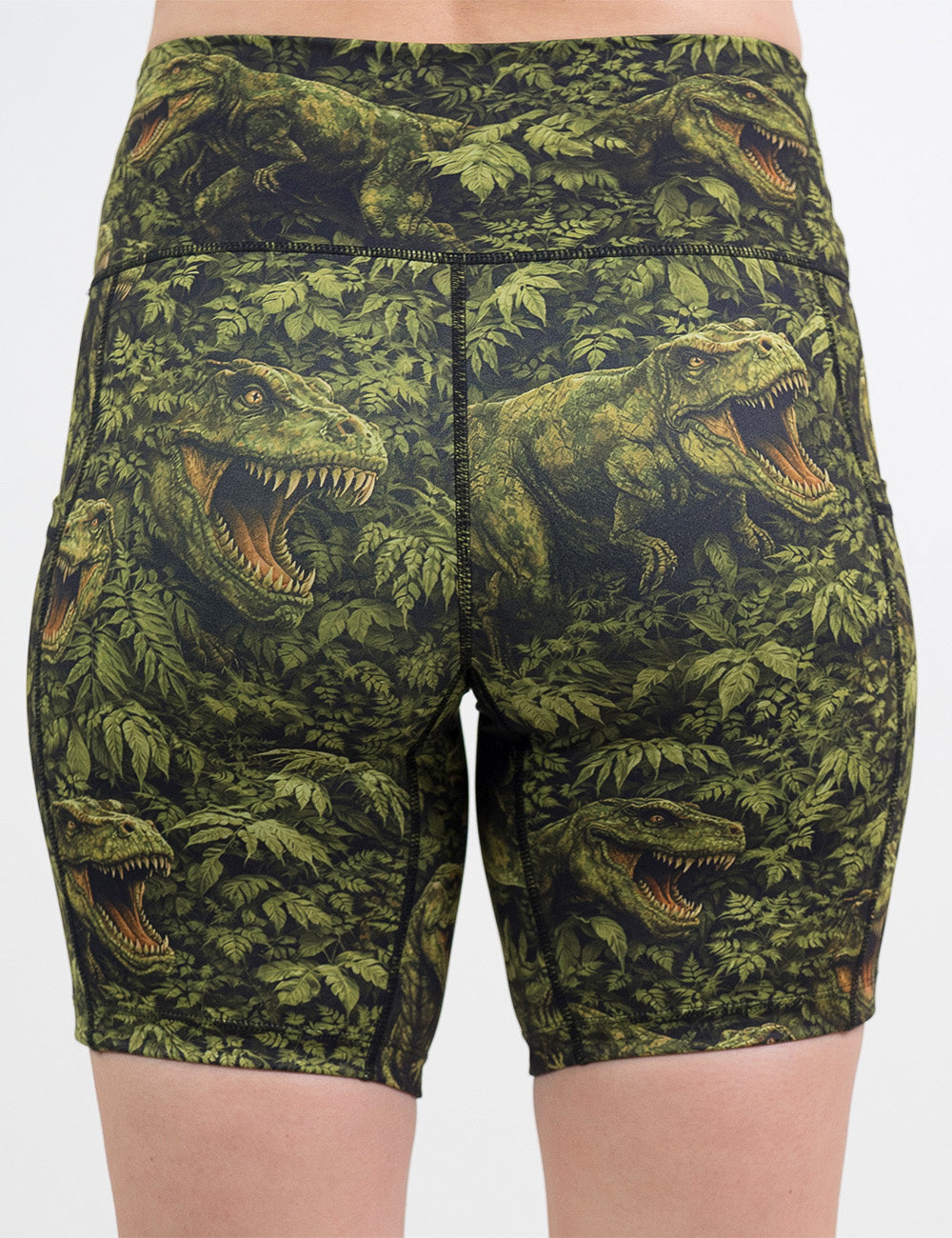 back of the 7 inch t-rex in a rainforest shorts against a white background