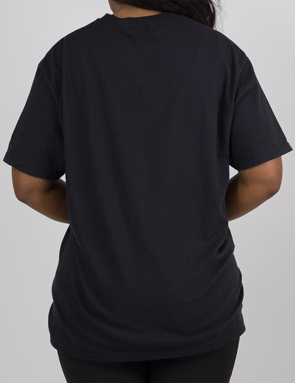 model wearing the black modern tee facing the back