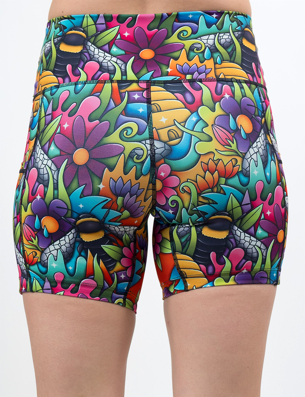 back of the cartoon bees against colorful cartoon flower print 5 inch shorts against a white background