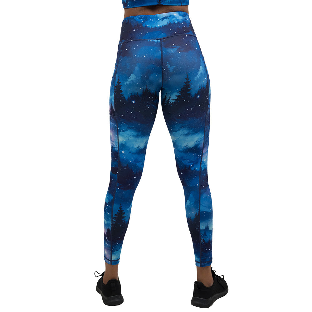 back of the blue sky and forest patterned leggings