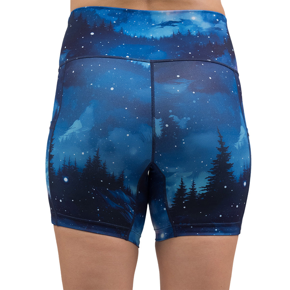 back of the blue sky and forest patterned shorts