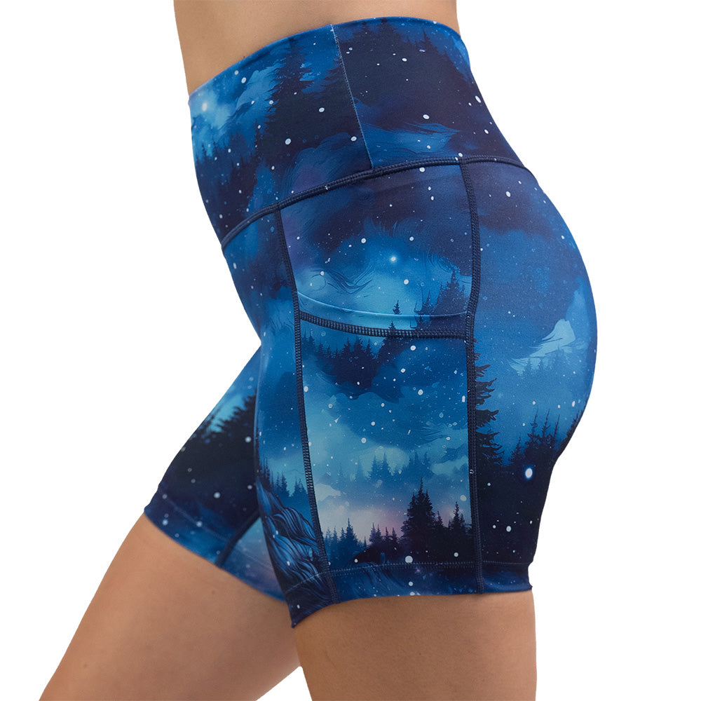 blue sky and forest patterned shorts