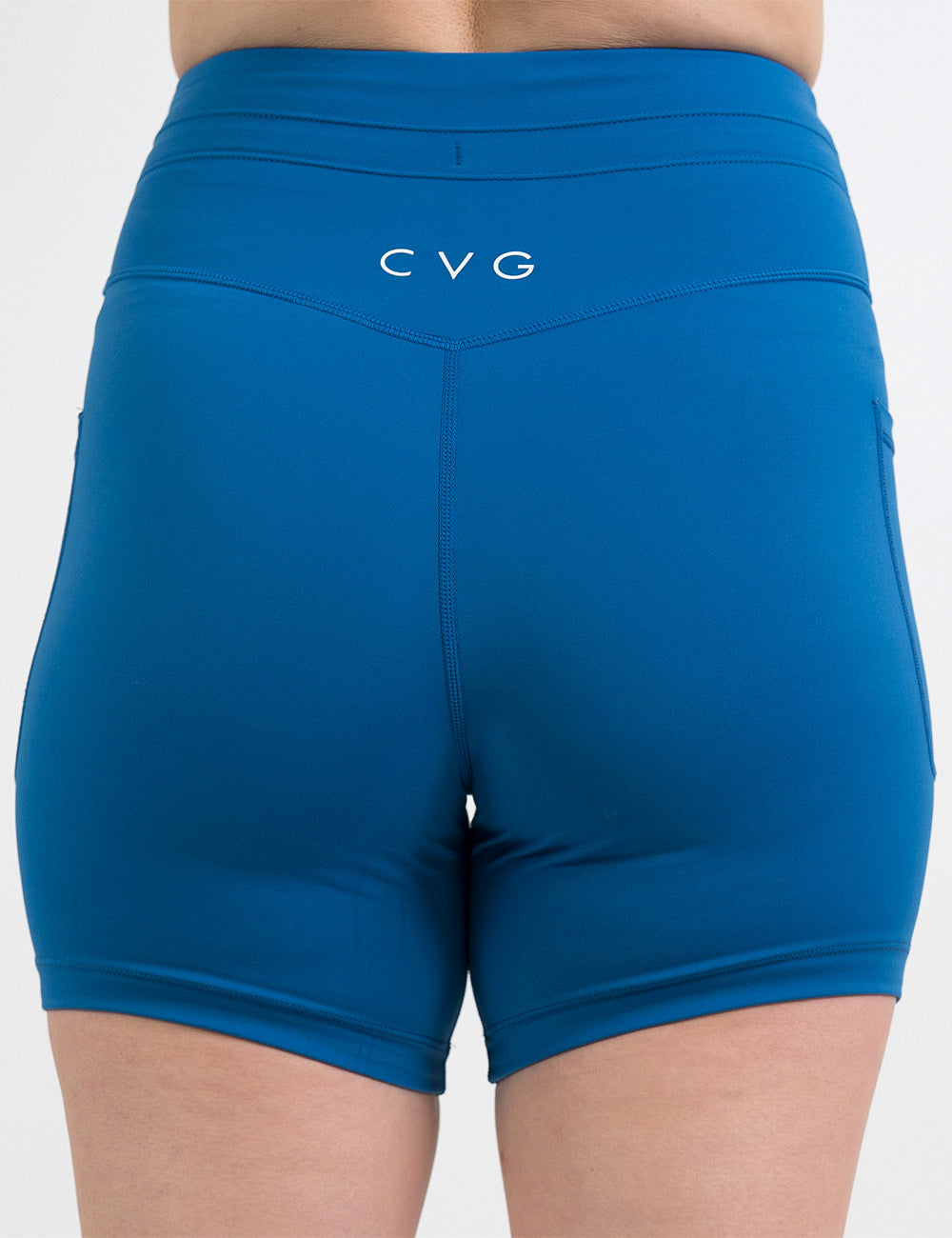 back of the 5 inch blue omni style shorts against a white background