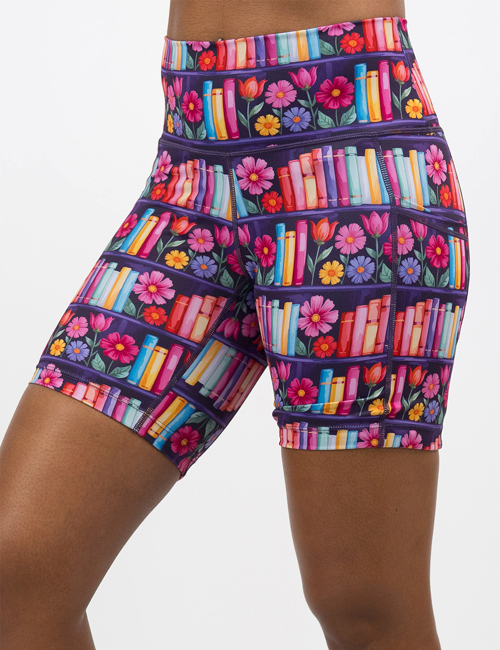 close up of the 7 inch brightly colored books and flowers shorts against a white background facing the front