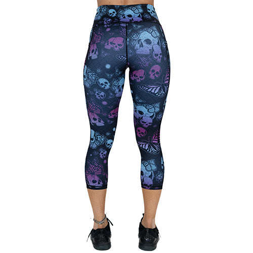 back of capri length purple and blue skull and butterfly leggings