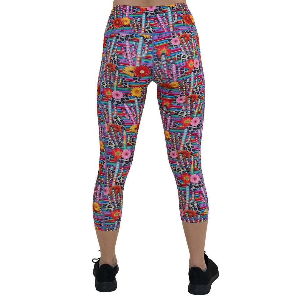 back of the colorful cactus and flower print leggings