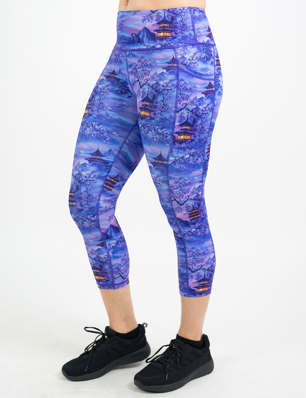 front of the capri lavender and blue floral full length leggings featuring traditional pagodas and blooming cherry trees