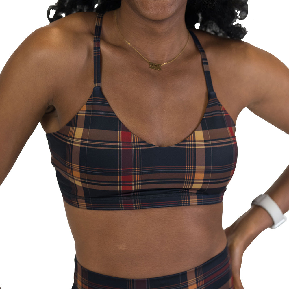 brown, yellow & red plaid patterned sports bra