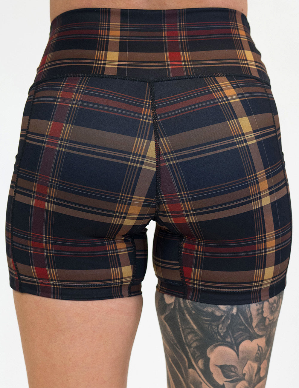 back of the 5 inch black, red, and gold plaid shorts against a white background