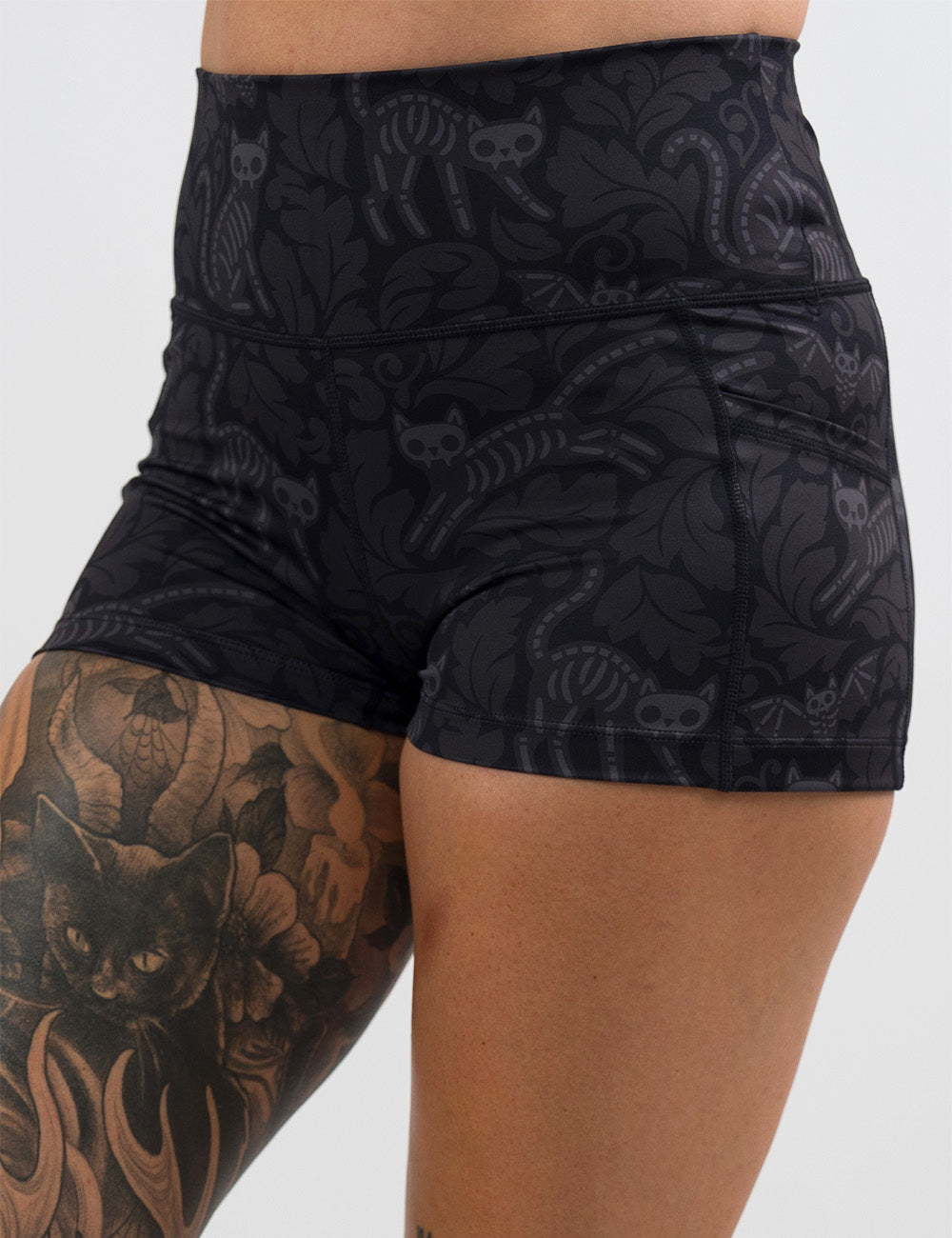 front of the 2.5 inch black and grey bats and cats skeleton shorts against a white background