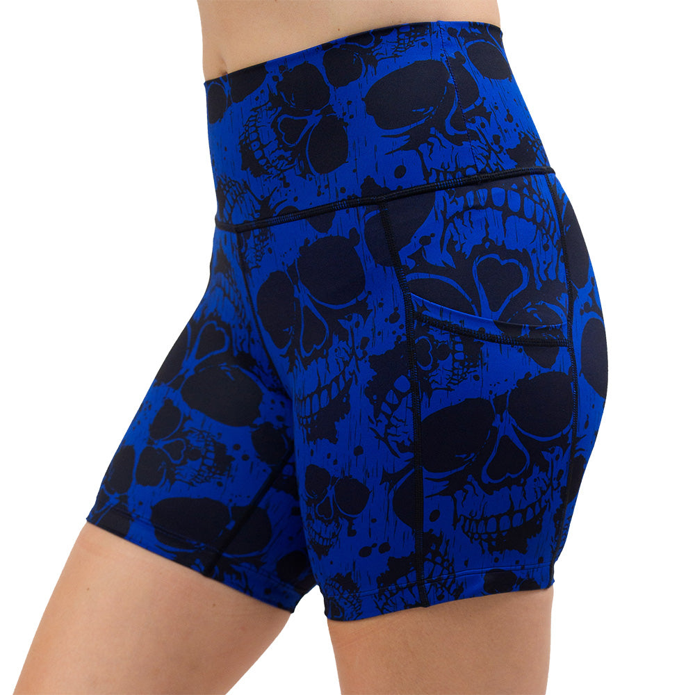 front of the 5 inch dark skulls against a blue background pattern shorts against a white background