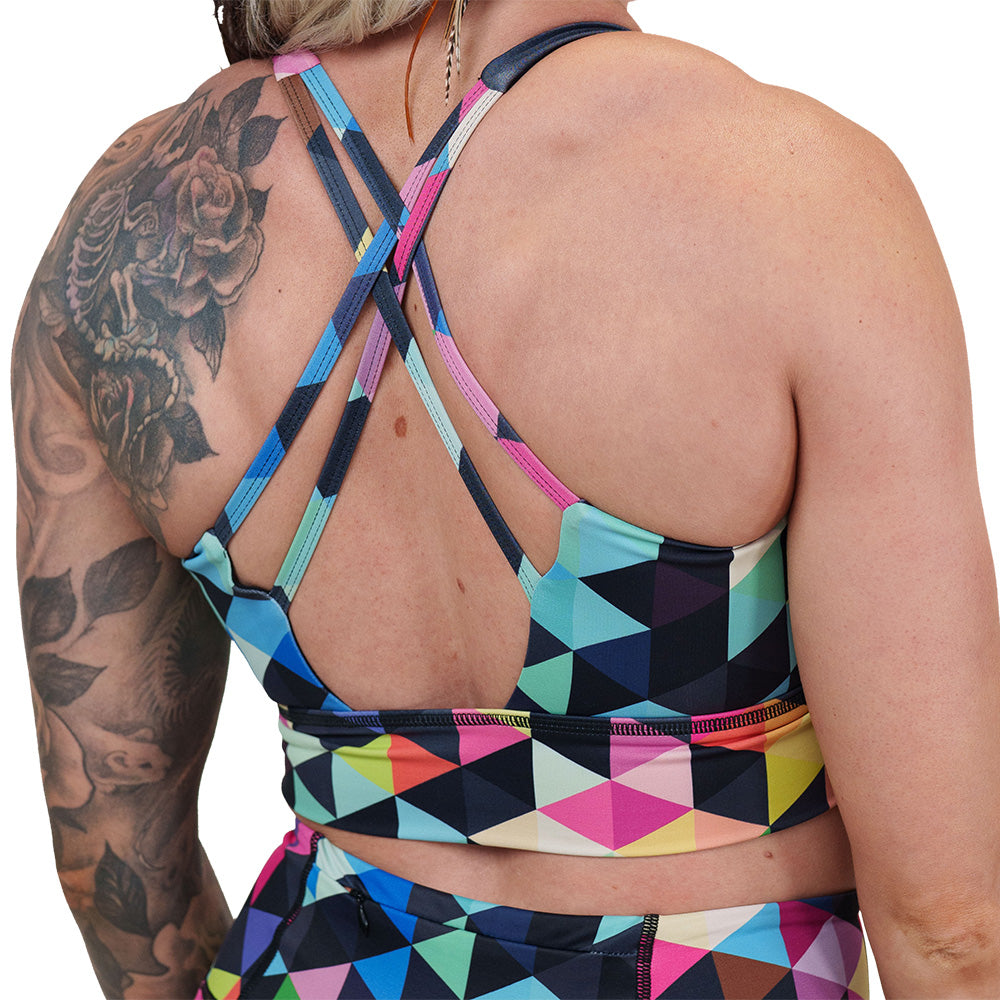 back of the rainbow color block patterned sports bra