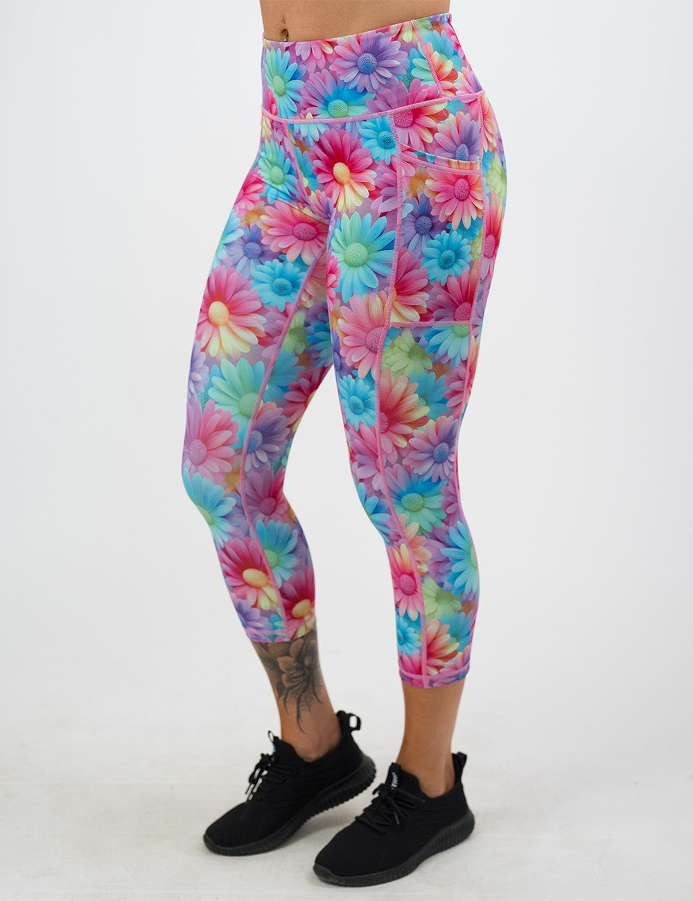 capri colorful flower pattern leggings facing the front against a white background