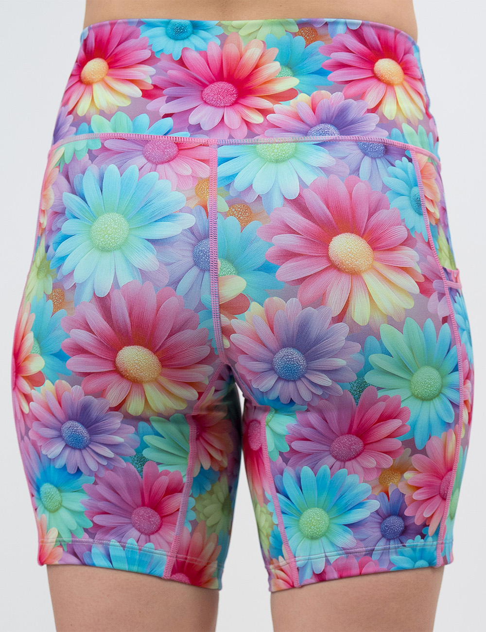 back of the 7 inch pastel colored flowers shorts against a white background