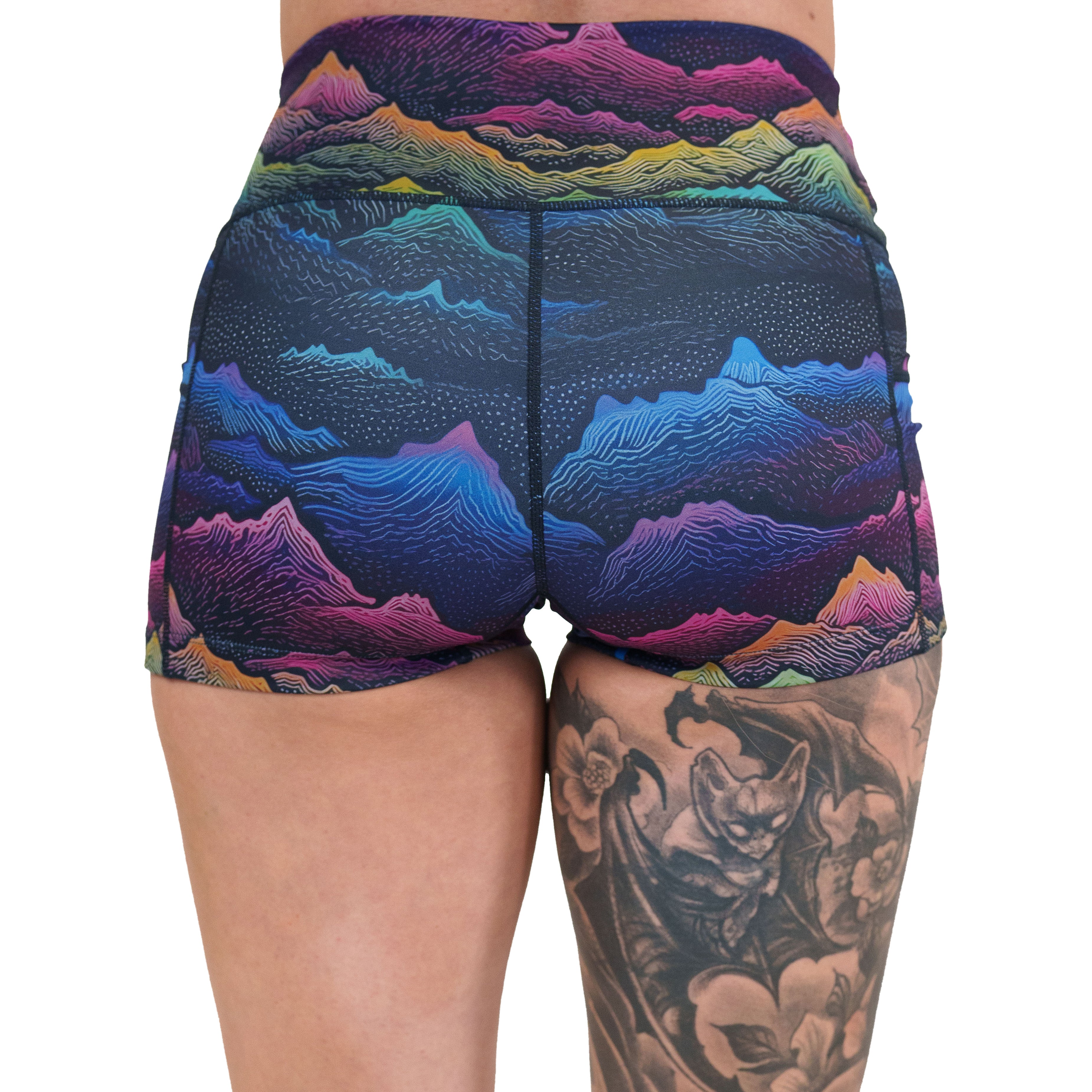 back of the colorful mountain print shorts